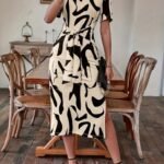 Kadın Kısa Kollu Bisiklet Yaka Desenli Belden Bağlamalı Yandan Yırtmaçlı Süprem Elbise