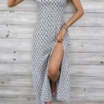 Kadın Ip Askılı V Yakalı Yırtmaçlı Uzun Süprem Elbise