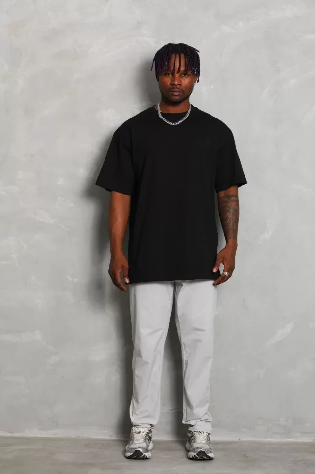 TY65d4bf869ed5165d4bf869ed53.webp Unisex Oversize Düz Bisiklet Yaka T-Shirt - Siyah - Görsel 1